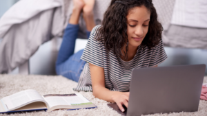 Student on Laptop at home